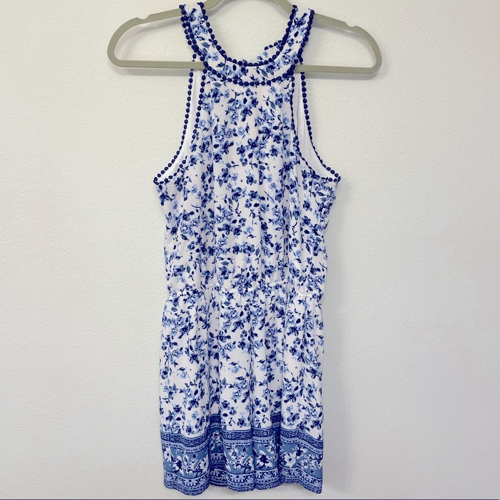 Francesca’s | Blue and White Floral Romper with Back Tie